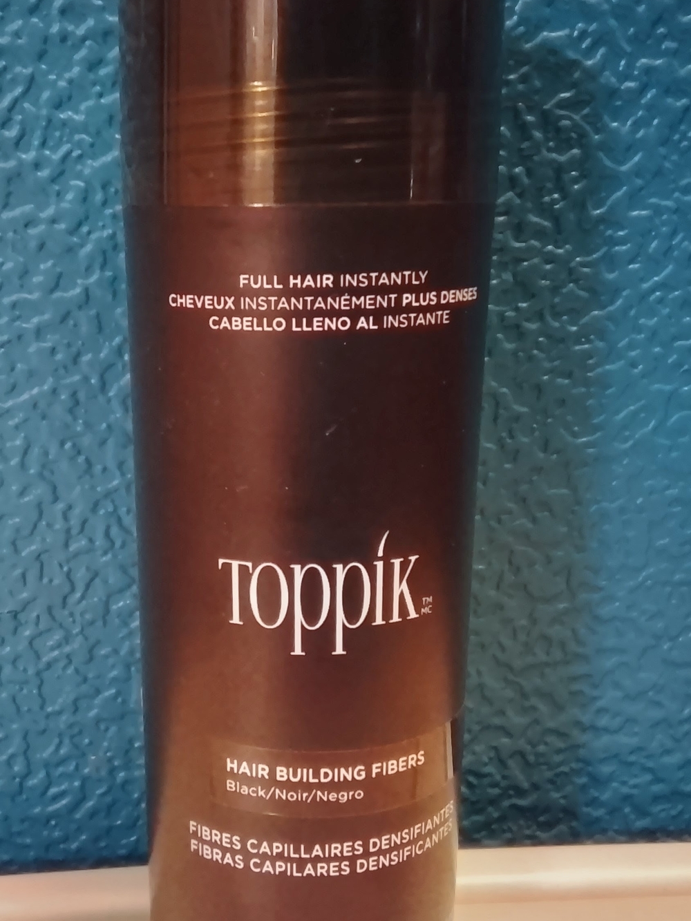 Toppik Hair Building Fibers in the color Black (Giant 55g / 1.94 oz size)